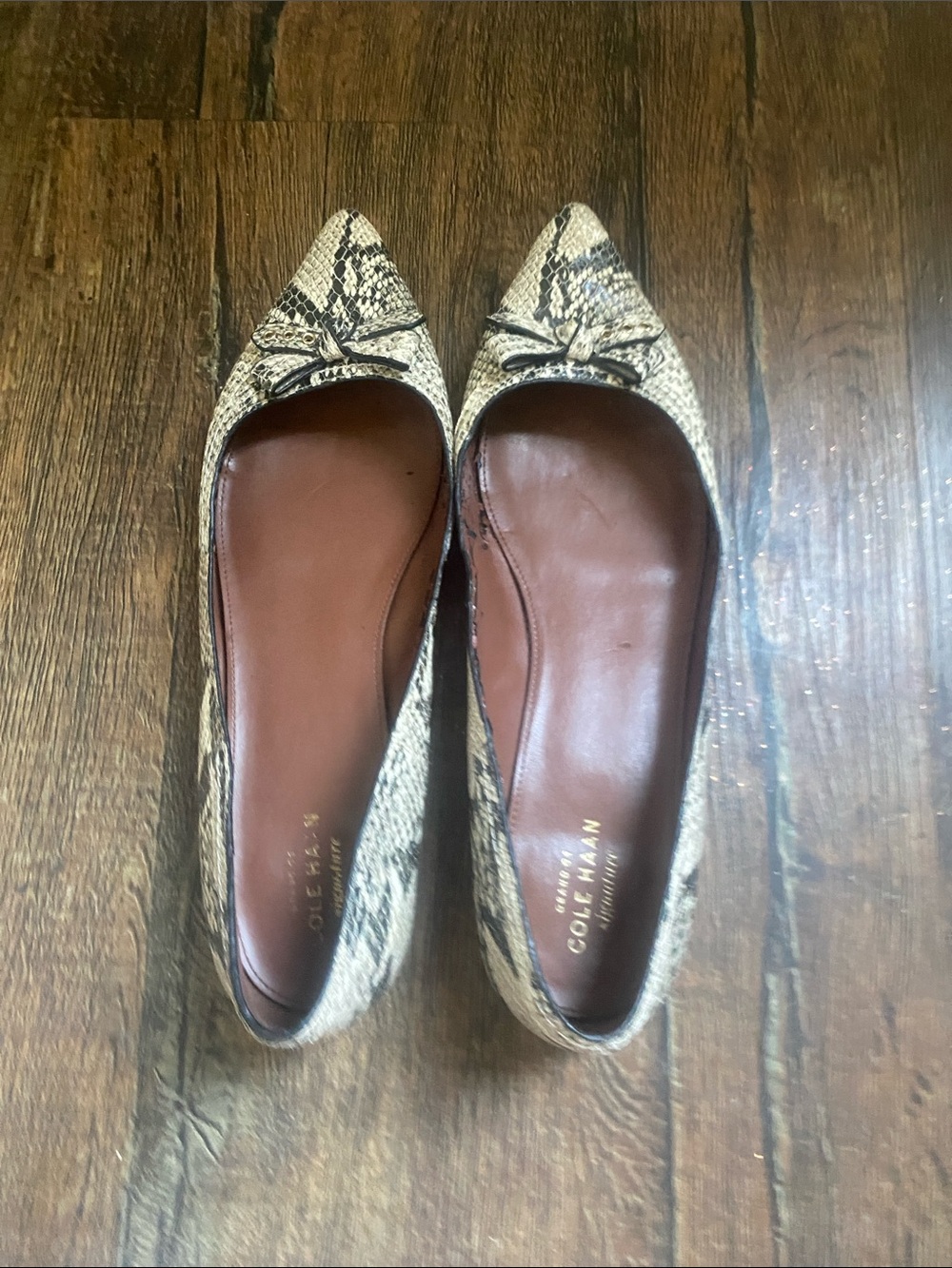 Cole Haan Pointed Snake-Print Flats in Beige and Black